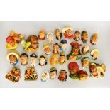 29 assorted Bosson's heads wall plaques.