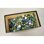 A mixed collection of marbles - varying sizes, styles and ages.