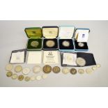 A quantity of boxed ROYAL MINT silver proof coins to include 50p Faulklands Island approx 28.