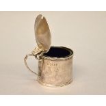 A Silver Georgian 'drum' mustard pot with engraved decoration,