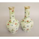 A pair of silver topped porcelain vases (silver A/F)