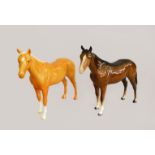 Two Beswick horses