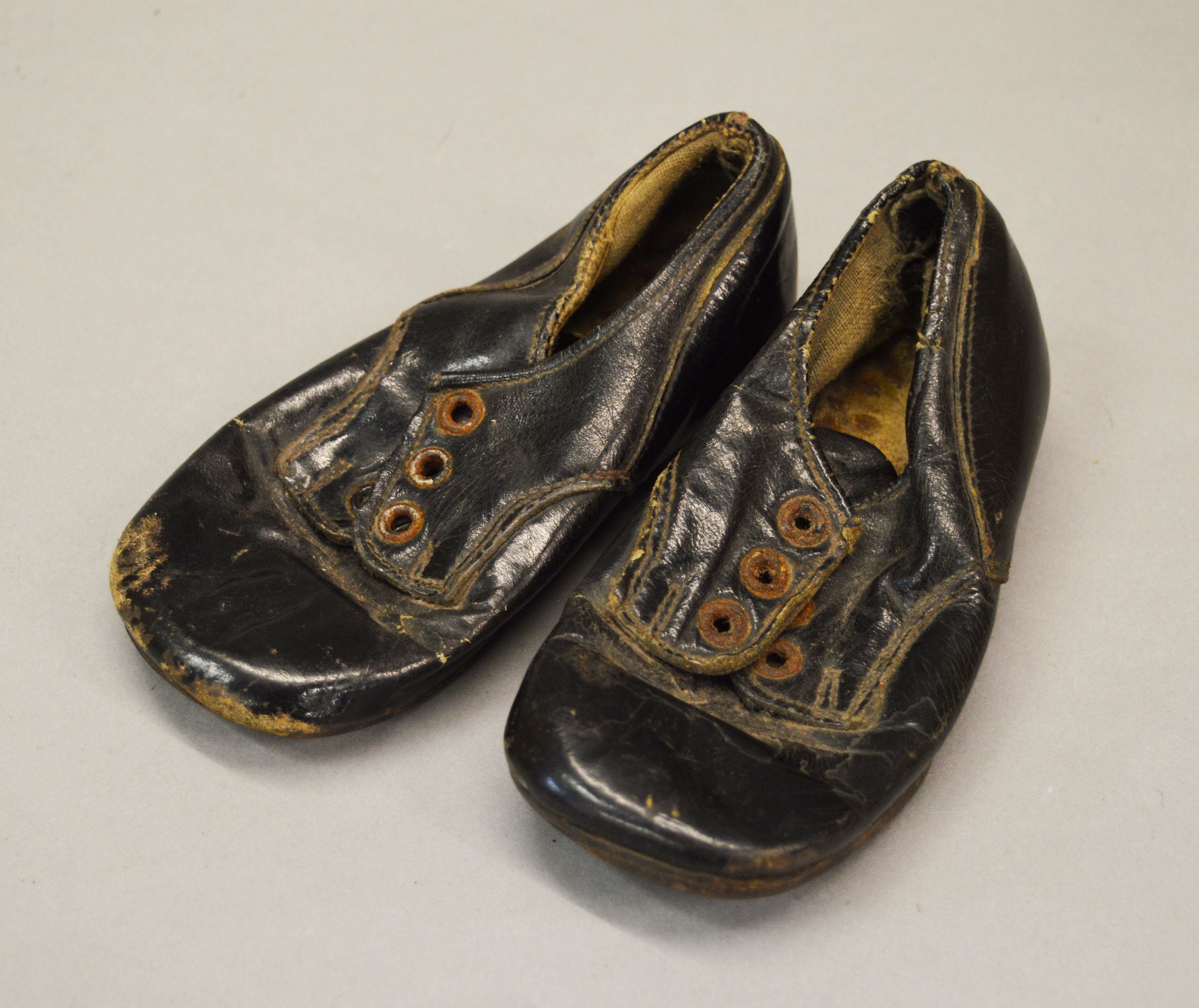 A pair of leather childrens shoes, probably late 19th/early 20th Century.