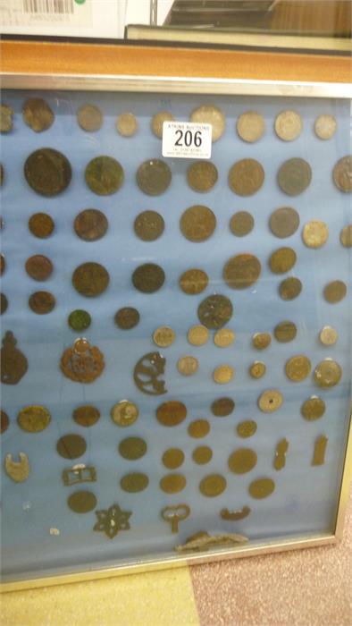 A framed collection of various coins, tokens etc. including hammered coins, cartwheel penny etc.