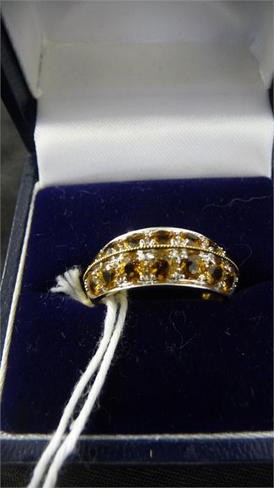 A 9 ct gold ring set with two rows of citrines ( 14)