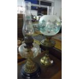 A Victorian oil lamp and one other