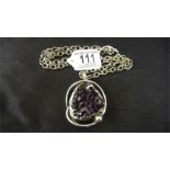 A heavy Danish silver pendant on chain set with a natural amethyst formation,"Smykkesmeden Danmark"