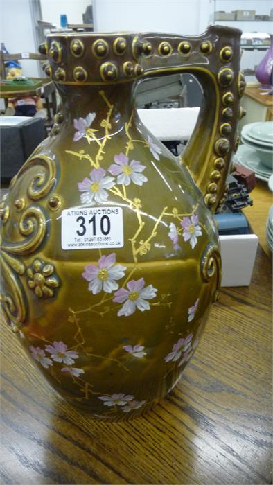 A Zsolnay Pecs jug with gilt and floral decoration- very slight damage to handle