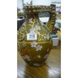 A Zsolnay Pecs jug with gilt and floral decoration- very slight damage to handle