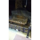 A cast iron fire grate and one other