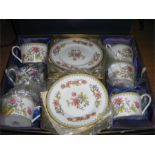 A boxed Coalport Persian Flower tea set