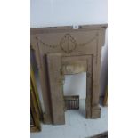 A cast iron fire surround and grate