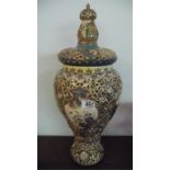 A large Fischer reticulated vase with lid- restoration to lid- 53cm