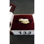 Two interlocking wishbone rings, both 9ct gold ( 1 white gold, 1 yellow) set with diamonds- 6.95g