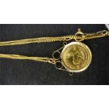 A 1/10th Krugerrand set in a 9ct gold mount with matching chain -total weight 7.19g