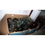 A collection of various glass bottles etc