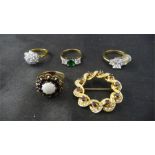 An opal and garnet cluster ring ( unmarked) along with a seed pearl brooch and some dress rings (5)