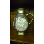 A Zsolnay jug with gilded handle and three "plaques" depicting castellated scenes- age related