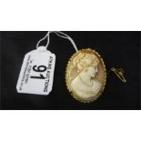 A cameo set in 18ct gold mount with safety chain and option to hang as a pendant