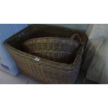 A large laundry basket and one other