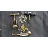 2 corkscrews a Bosuns whistle, Royal Artillery badge and an SCM brooch