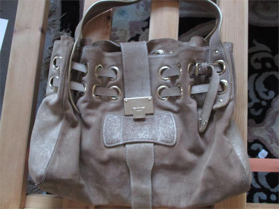 A Jimmy Choo "Ramona" tote bag in metallic gold suede