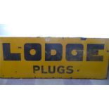 An enamelled sign "Lodge Plugs"