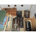 A quantity of 6 morse code keys along with a collection of radio books and guides