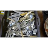 A wooden cutlery tray containing various silver plated cutlery etc