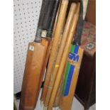 A quantity of vintage cricket bats, stumps etc.