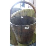 A wooden bucket with metal bindings
