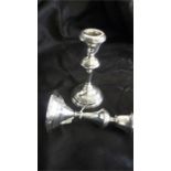 A pair of hallmarked silver candlesticks