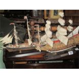 A "Sovereign of the Seas" model man of war ship and a "Cutty Sark" model sailing ship