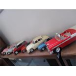 7 various model cars including 1956 Chevvy, 1957 Corvette, Jaguar and Mercedes