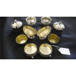 5 pairs of silver plated salts of varying designs