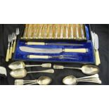 A cased set of hallmarked silver handled cutlery, along with a "Eureka " three piece carving set and