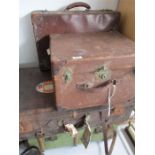 A quantity of vintage suitcases etc.