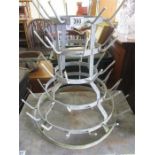 A five tier French galvanized wine bottle drier