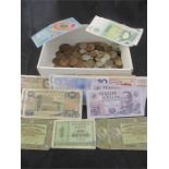 A quantity of various coins and bank notes