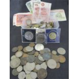 A quantity of various coins and bank notes