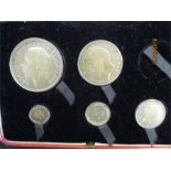 A proof set of silver coins, 1927, five coins in fitted case, one coin lacking- in original red