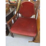 A 19th Century mahogany sword chair (typically used in the officers mess for those wearing a sword