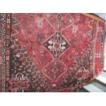 A large red ground rug