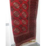 A large red ground rug