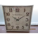 A modern vintage style wall clock (new in box)