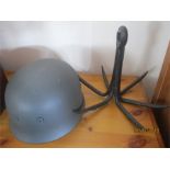 A reproduction helmet and a grappling hook