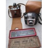 Two vintage Kodak cameras along with a Juvenile set of lantern slides of war scenes