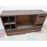 An Art Deco oak shop/Post Office counter top unit with post box and four drawers under