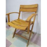 A Herlag folding chair