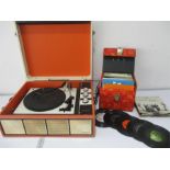 A vintage 'Alba Golden Disc' record player along with a quantity of various singles